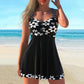 Costume da bagno a due pezzi con top con spalline e pantaloncini aderenti