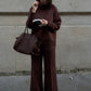 Set composto da felpa con collo alto e pantaloni con cerniera laterale