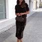 Elegante top con dettaglio a fiocco e gonna con paillettes