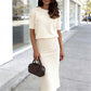 Elegante top con dettaglio a fiocco e gonna con paillettes