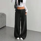 Pantaloni casual a vita alta e taglio ampio da donna