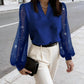 Top con scollo a V e maniche trasparenti con paillettes
