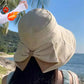 Cappello da donna con fiocco e tesa larga per proteggersi dal sole