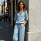 Completo da donna in lino a due pezzi: top con scollo a V e pantaloni.