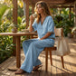 Completo da donna in lino a due pezzi: top con scollo a V e pantaloni.
