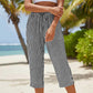 Pantaloni a zampa a righe in cotone e lino da donna con tasche